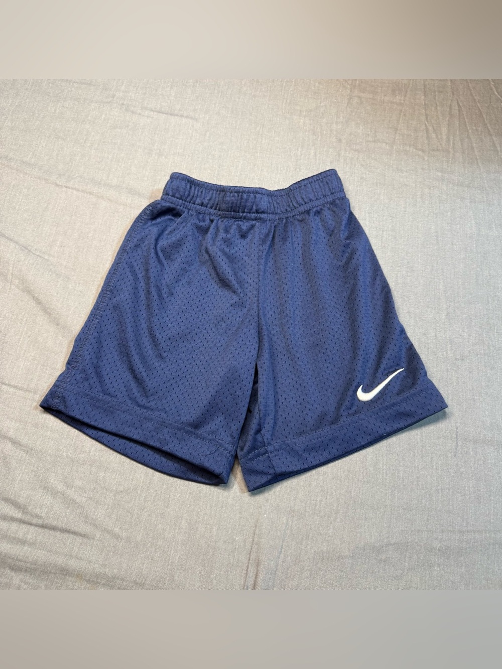 Nike Navy Blue Mesh Athletic Shorts with White Swoosh